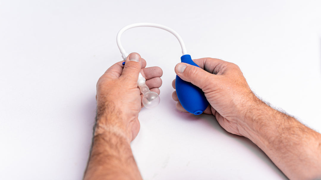 A man holding the Novoglan Phimosis Treatment medical device